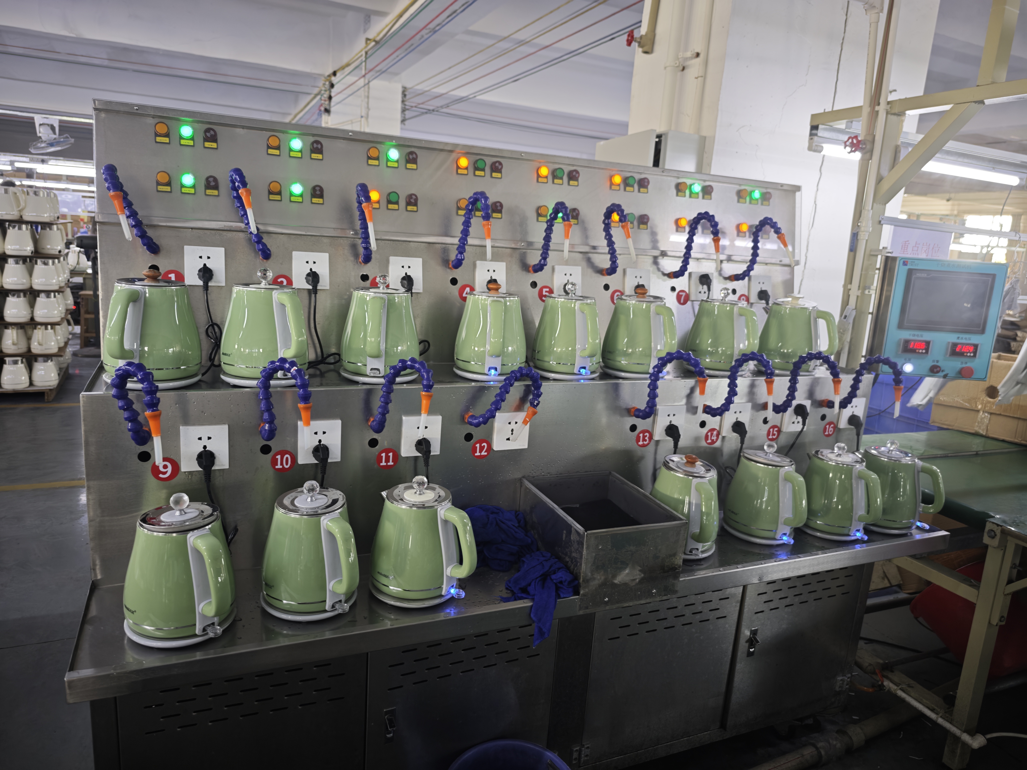 Electric kettles undergoing powered function and performance testing