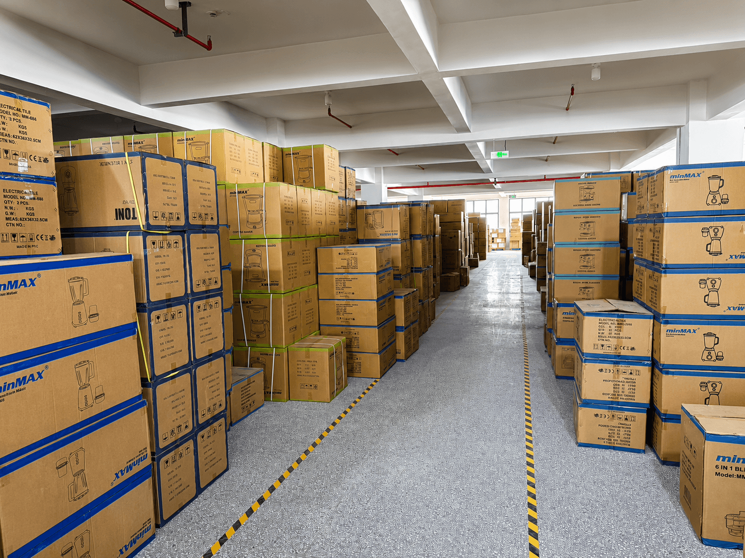 Warehouse stocked with minMAX appliance cartons